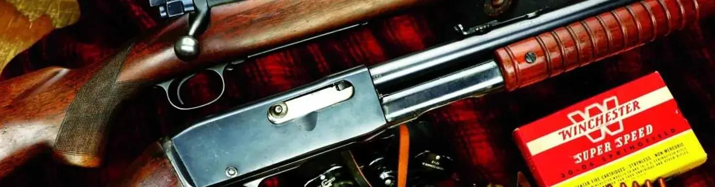 Winchester ammunition box with classic shotgun and rifle