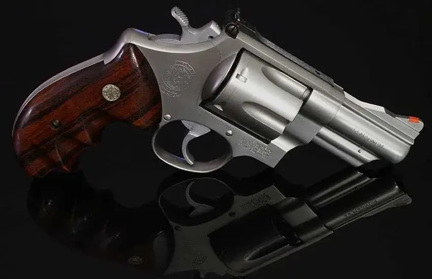 Smith & Wesson stainless steel revolver with wood grips