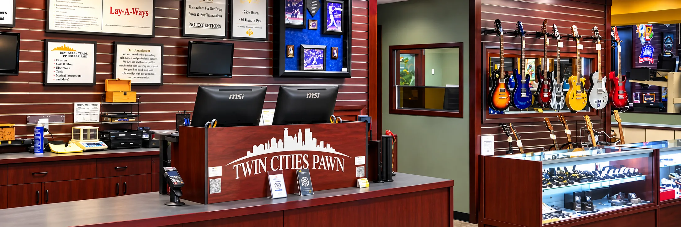 Inside Twin Cities Gun & Pawn &mdash; the main counter with guitars and jewelry display